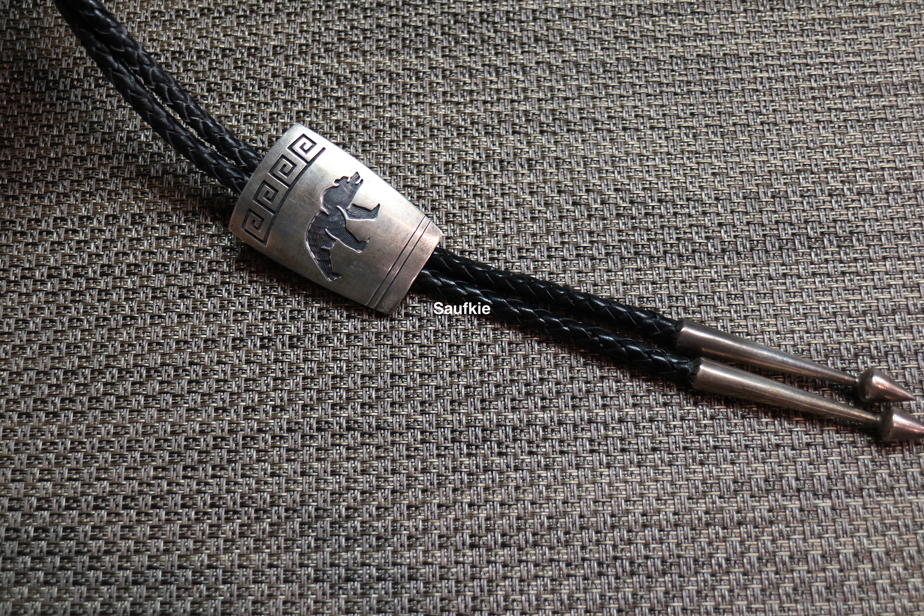 Lawrence Saufkie, Hopi Bear bolo tie | Gorman Museum