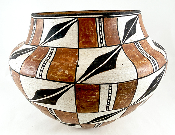 Round painted pottery jar with black leaf motifs and brown geometric panels