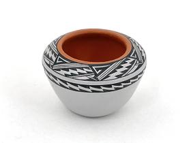 jar in white with black ornamentation at rim