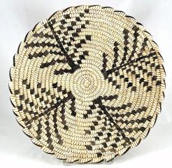 light basket with leaf-shaped design in black