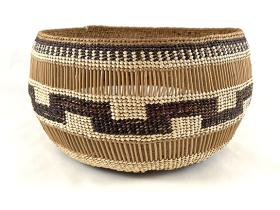 basket with geometric rectangular designs and open weave at rim
