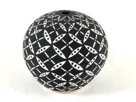 white seedpot with black geometric design