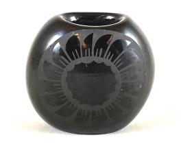 blackware pot with etched sun design
