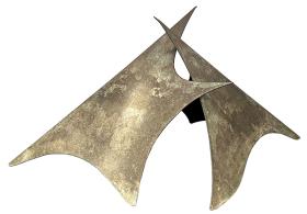 Abstract sculpture with two curved, pointed metallic forms intersecting.