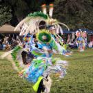 fancy dancer in powwow ring
